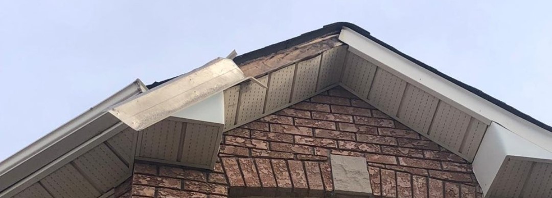 Aluminum fascia damaged by wind 